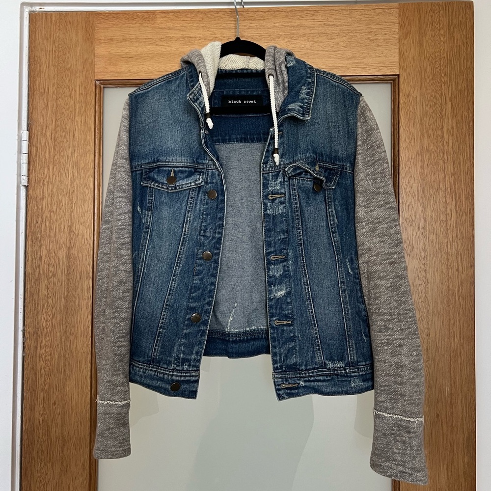 Denim jacket with fabric sleeves